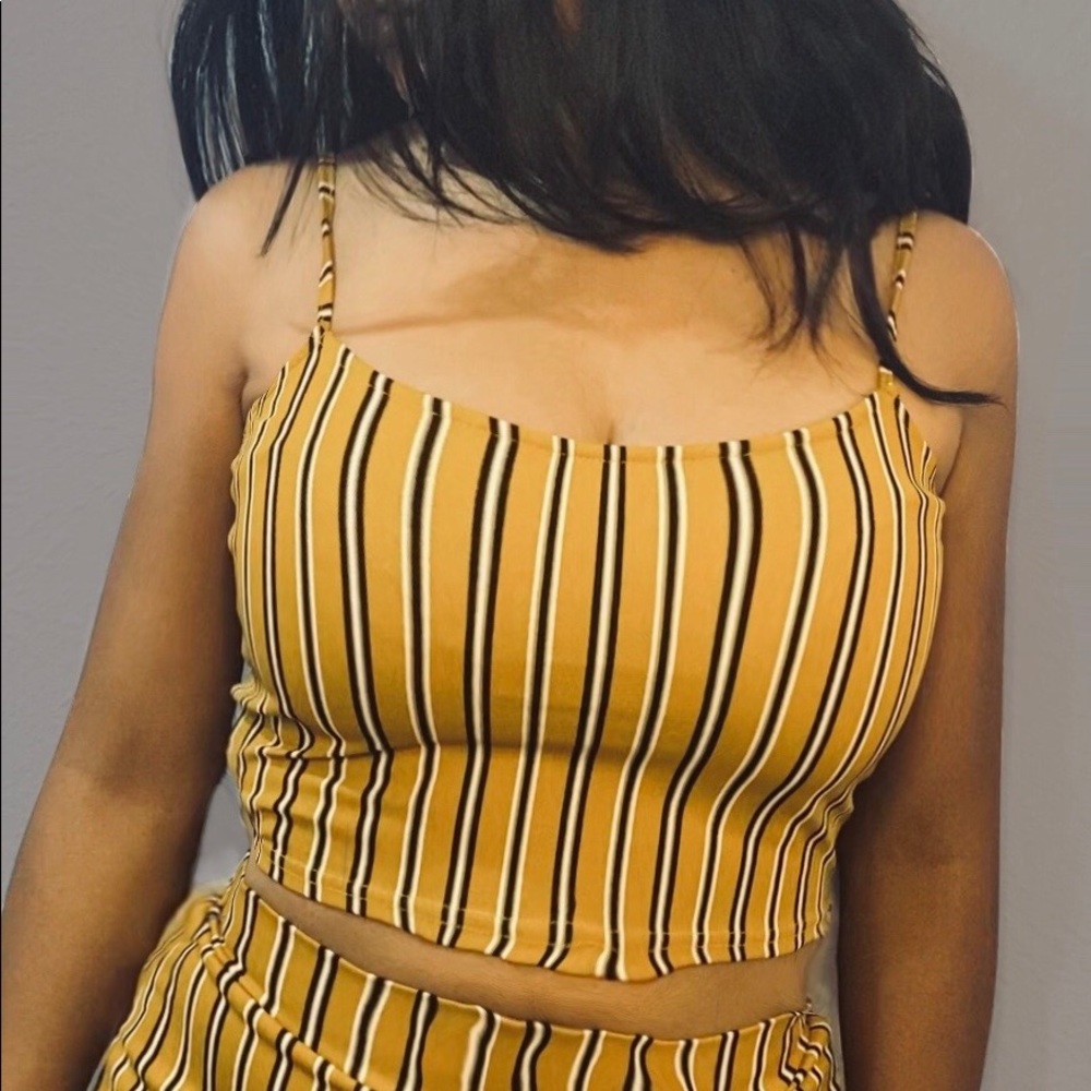 Striped gold black and white two piece.